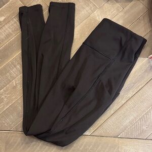 Athleta Ultimate Stash Pocket 7/8 Tight in Black